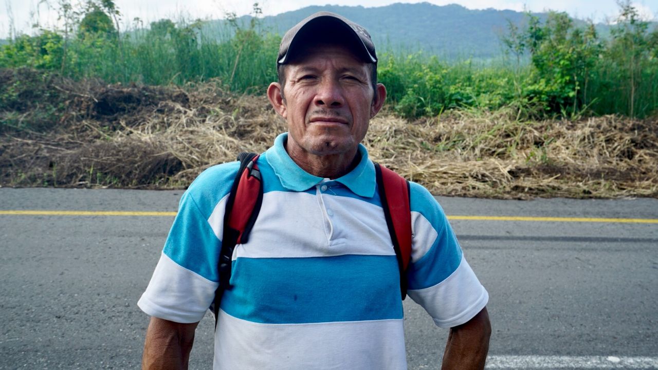 Carlos Gomez takes a break on the road north near Arriaga, Mexico.
