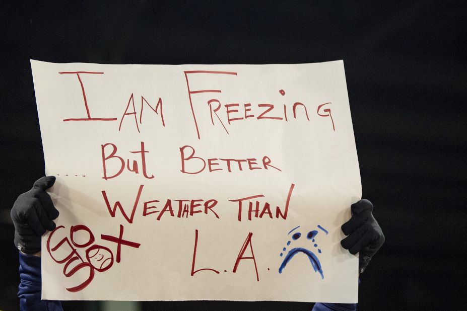 A fan holds up a sign during Game 2.