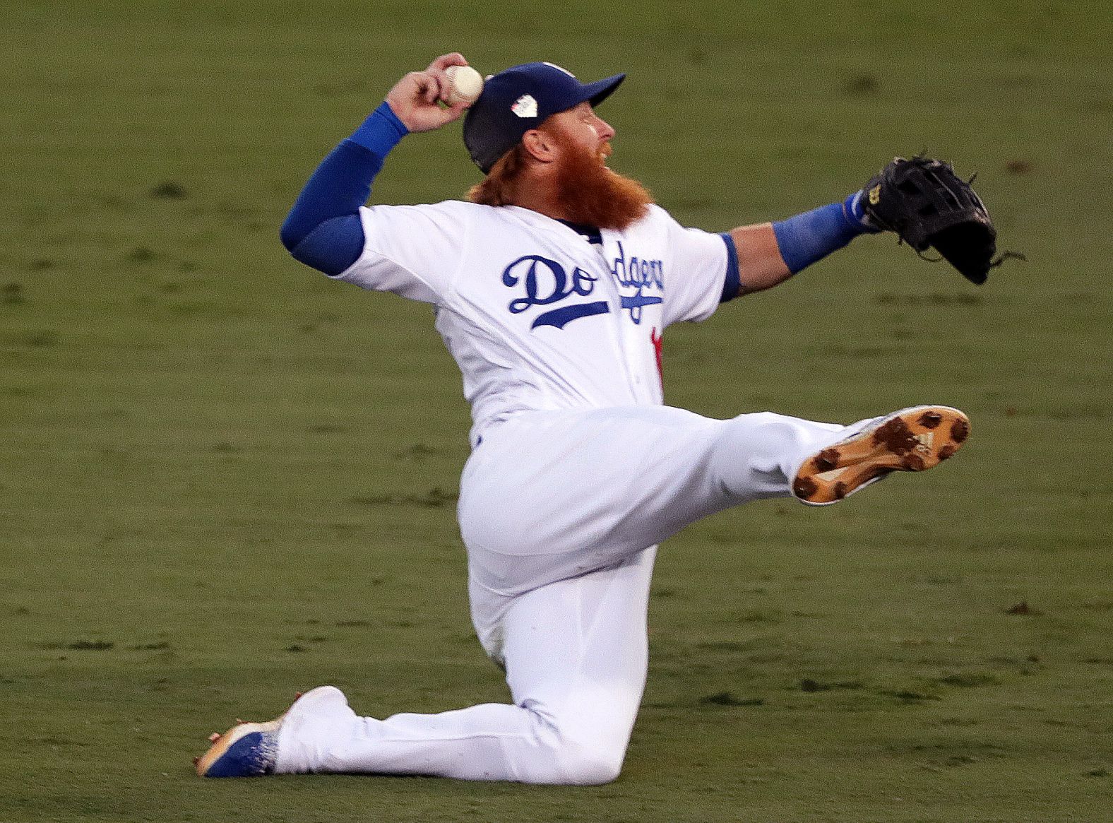 Dodgers third baseman Justin Turner fields a single by Red Sox center fielder Jackie Bradley Jr. during the third inning of Game 3 at Dodger Stadium.