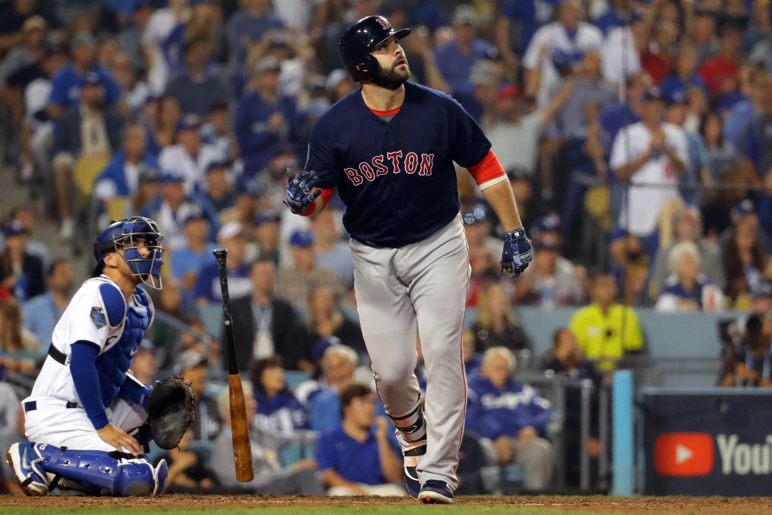 Mitch Moreland of the Red Sox hits a three-run home run in the seventh inning during Game 4. The Red Sox won the game 9-6 to take a 3-1 series lead.