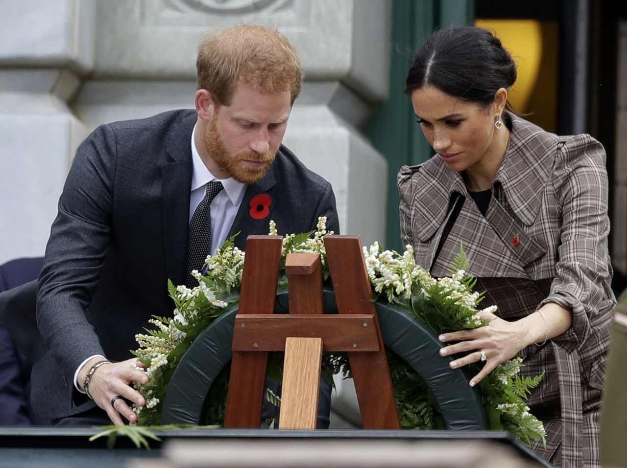 Harry and Meghan lay a wreath at the Tomb of the Unknown Warrior in Wellington, New Zealand, on Sunday.