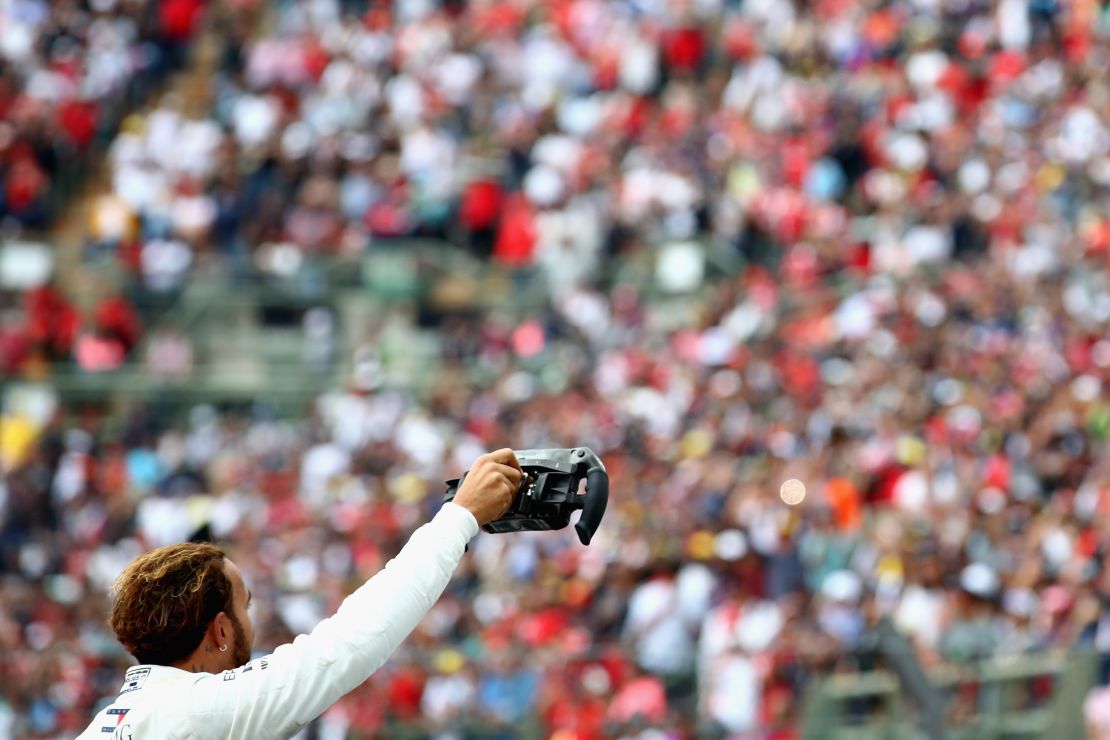 Lewis Hamilton received a great ovation from the crowd at the Autodromo Hermanos Rodriguez after clinching the world crown.