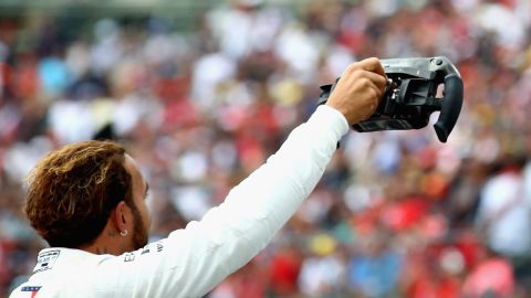 Lewis Hamilton received a great ovation from the crowd at the Autodromo Hermanos Rodriguez after clinching the world crown.