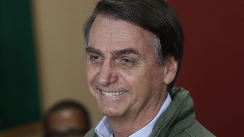 Brazil's right-wing presidential candidate for the Social Liberal Party (PSL), Jair Bolsonaro votes during runoff elections, in Rio de Janeiro, Brazil, on October 28, 2018. (Photo by RICARDO MORAES / POOL / AFP)RICARDO MORAES/AFP/Getty Images