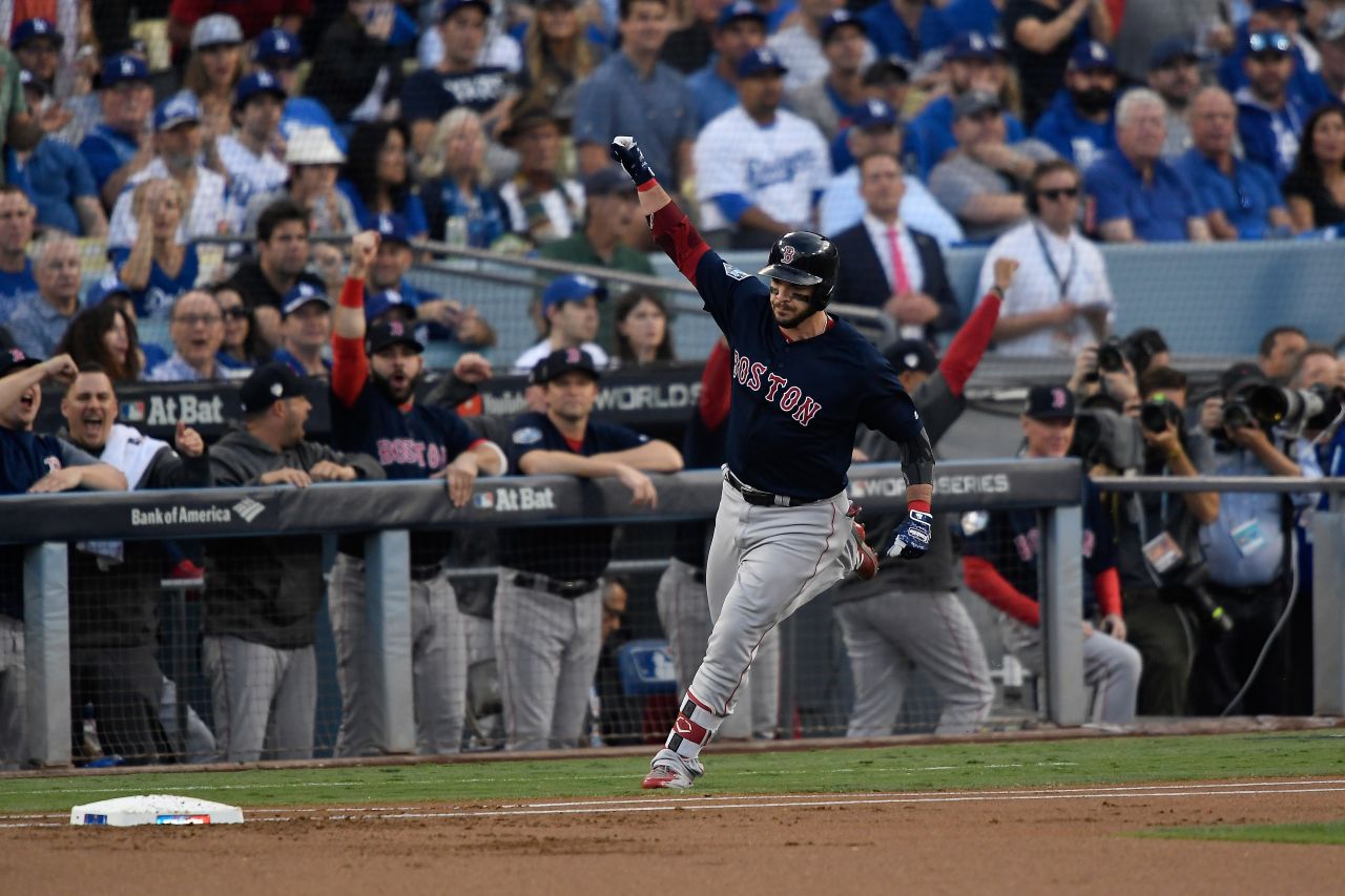 Steve Pearce of the Red Sox celebrates his first-inning two-run home run against the Dodgers in Game 5.