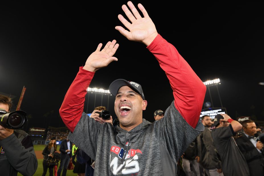 Alex Cora of the Boston Red Sox celebrates his team's World Series win over the Los Angeles Dodgers at Dodger Stadium in Los Angeles, CA.