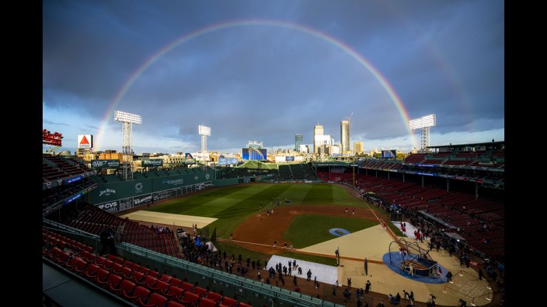 A rainbow forms over Fenway Park before Game 2 of the World Series on Wednesday, October 24.