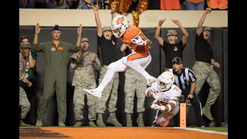 Oklahoma State wide receiver Tylan Wallace scores a touchdown against Texas on Saturday, October 27. Oklahoma State upset the Longhorns 38-35.