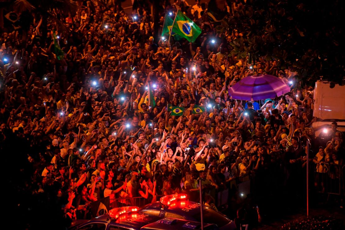Supporters of far-right presidential candidate Jair Bolsonaro celebrate in Rio de Janeiro on Sunday.