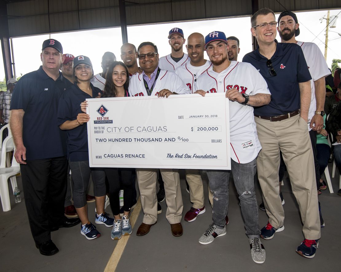 Boston Mayor Marty Walsh, Bekah Salwasser of the Boston Red Sox Foundation, Mayor of Caguas William Miranda Torres, Manager Alex Cora of the Boston Red Sox, and Boston Red Sox President & CEO Sam Kennedy in Caguas, Puerto Rico on January 30, 2018.