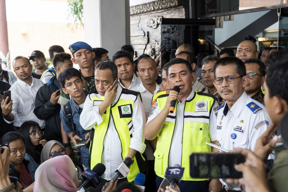 Bagus Sunjoyo, head of airport authority for Soekarno-Hatta International Airport, speaks to members of the media during a news conference.