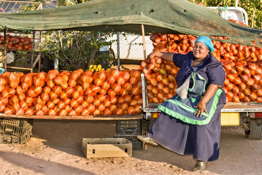 One of AfricanStockPhoto's bestselling images depicts a female street vendor.