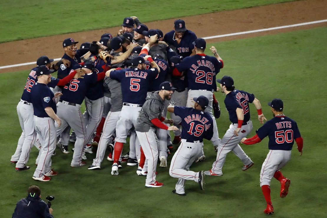 The Boston Red Sox celebrate their 5-1 win over the Los Angeles Dodgers in Game Five to win the 2018 World Series at Dodger Stadium.