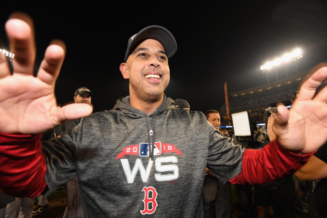 Alex Cora celebrates his team's 5-1 win, closing out the World Series.