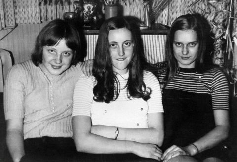 Merkel, left, attends a New Year's Eve party with friends in Berlin in 1972. In 1977, at the age of 23, she married her first husband, Ulrich Merkel. They divorced in 1982, but she kept the name.