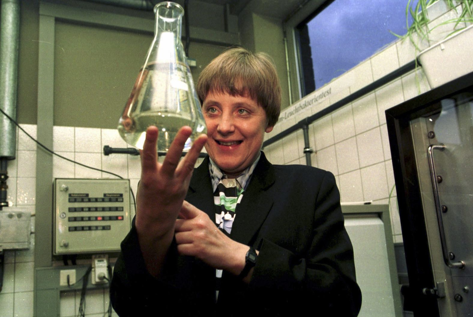 Merkel changed Cabinet positions in 1994, becoming Minister of the Environment, Nature Conservation and Nuclear Safety. Here, she visits a water-control station in Bad Honnef, Germany, in 1995.