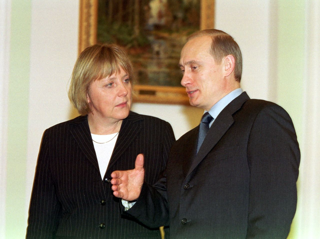 Merkel meets Russian President Vladimir Putin in 2002, one of many meetings they would have over the years. Merkel speaks Russian fluently, while Putin speaks German.