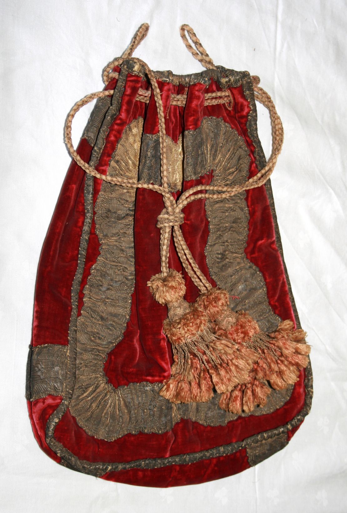 A red velvet bag was discovered in the attic of West Horsley Place, the former home of Sir Walter Raleigh's wife and son.