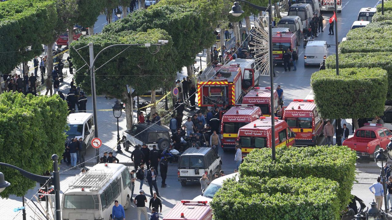 Police and firemen respond after a suicide attack in the Tunisian capital, Tunis.