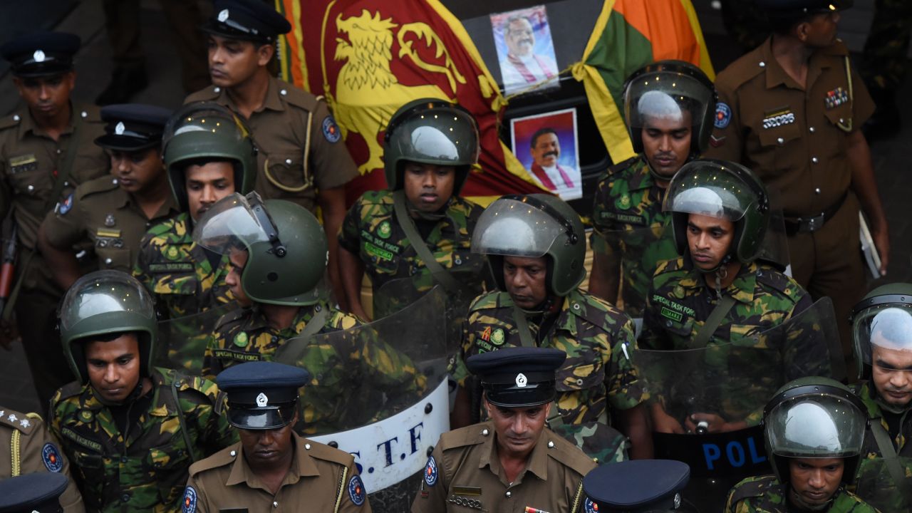Sri Lankan soldiers keep watch outside the Ceylon Petroleum Corporation in Colombo on October 28, 2018. 