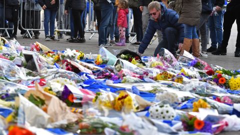 Flowers are piled up outside the King Power Stadium in Leicester following the death of the club's owner in a helicopter crash. 