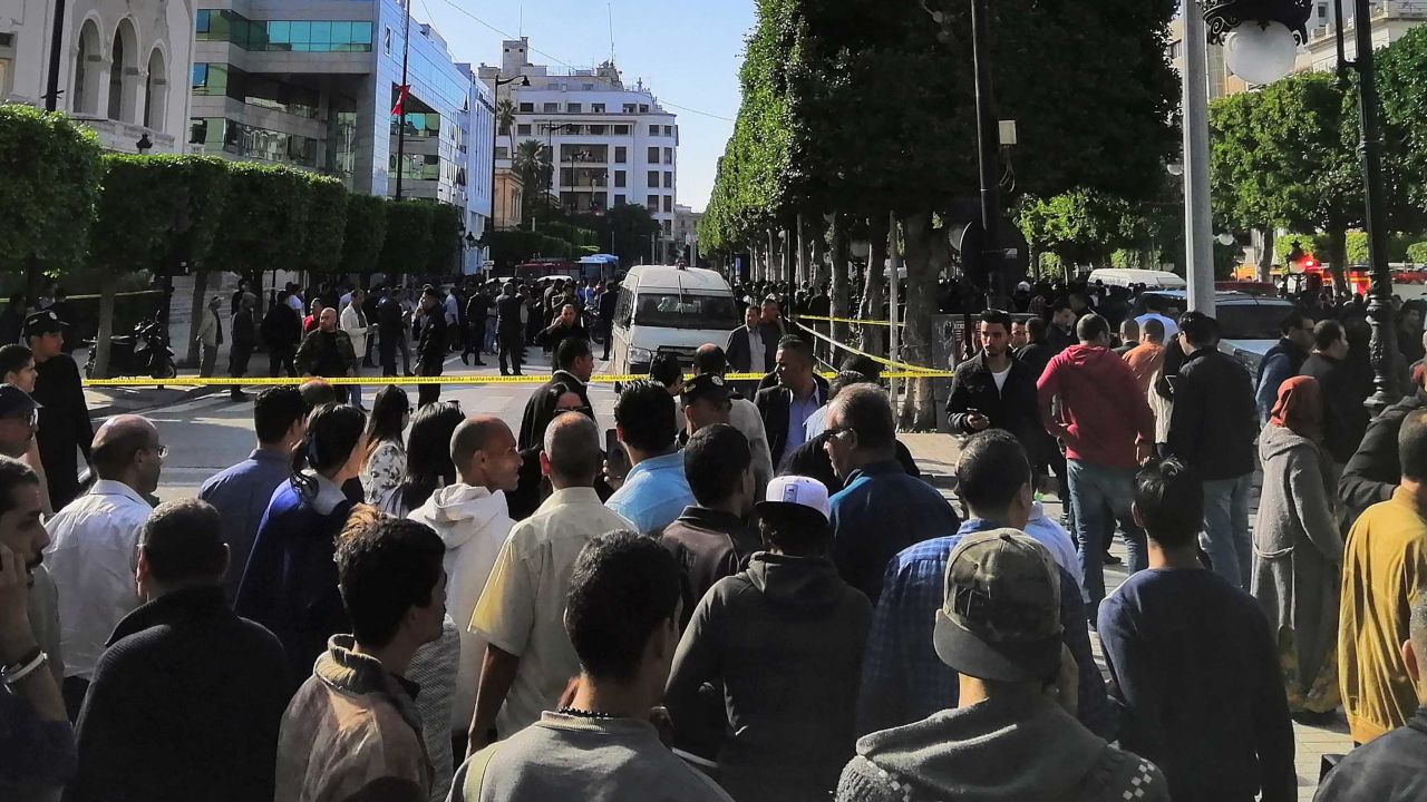 Crowds gather near the site of an explosion in the center of Tunis.