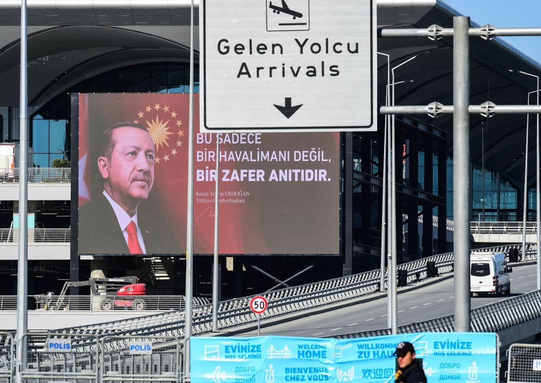 The terminal of the new Istanbul Airport, with a banner featuring Turkish President Recep Tayyip Erdogan.
