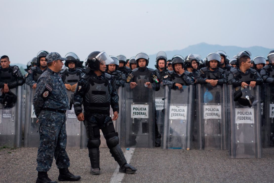 Police said they blocked the caravan to explain Mexico's offer of aid. 