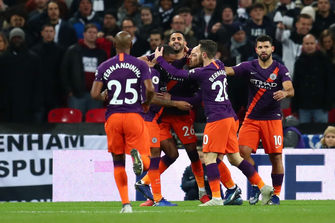 Manchester City celebrate after Mahrez's goal.