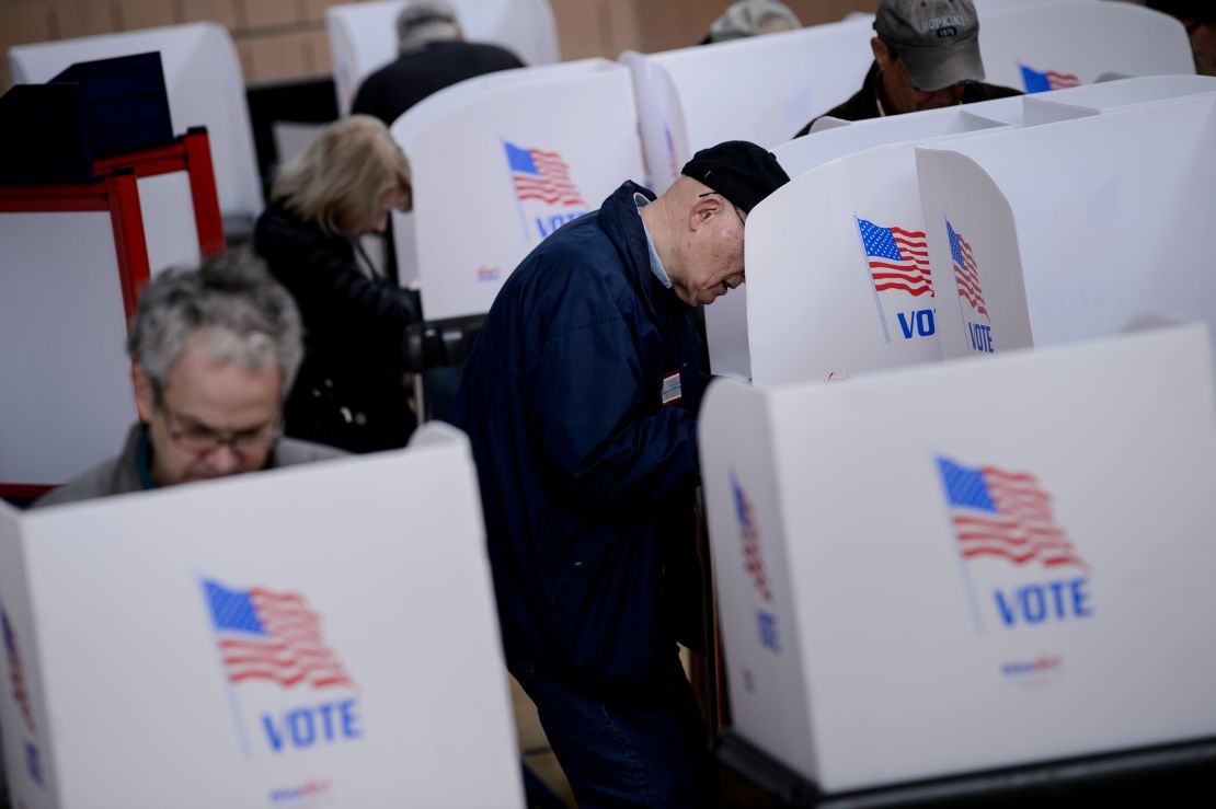 People cast their ballots during early voting October 25, 2018 in Potomac, Maryland.