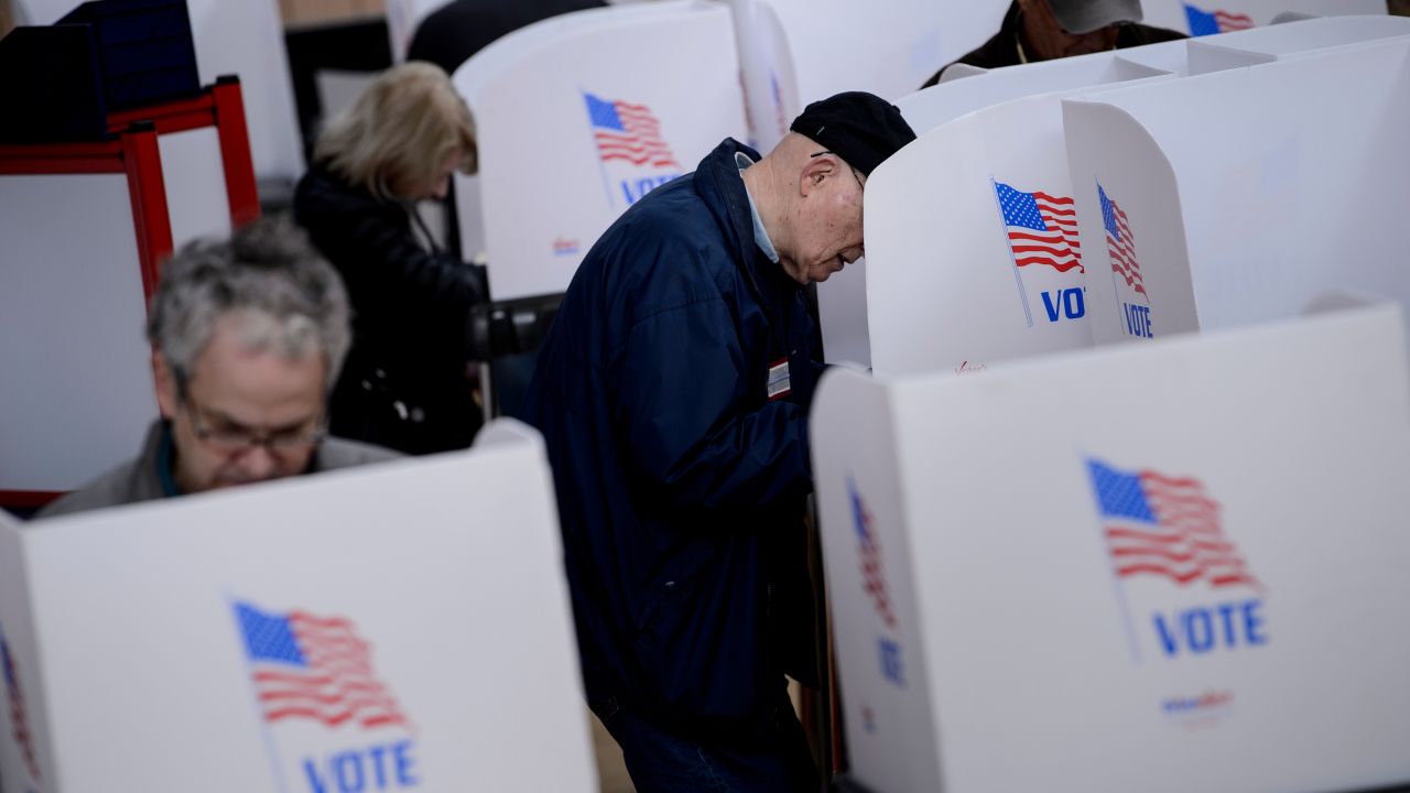People cast their ballots during early voting October 25, 2018 in Potomac, Maryland.