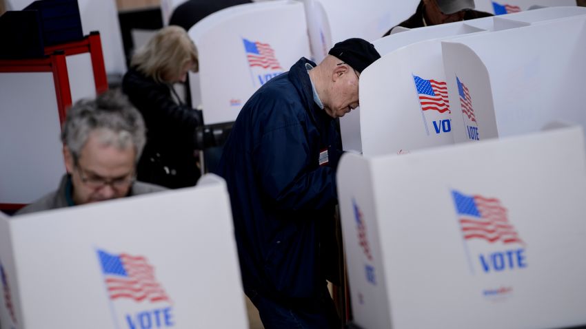 People cast their ballots during early voting at a community center October 25, 2018 in Potomac, Maryland, two weeks ahead of the key US midterm polls. (Photo by Brendan Smialowski / AFP)        (Photo credit should read BRENDAN SMIALOWSKI/AFP/Getty Images)