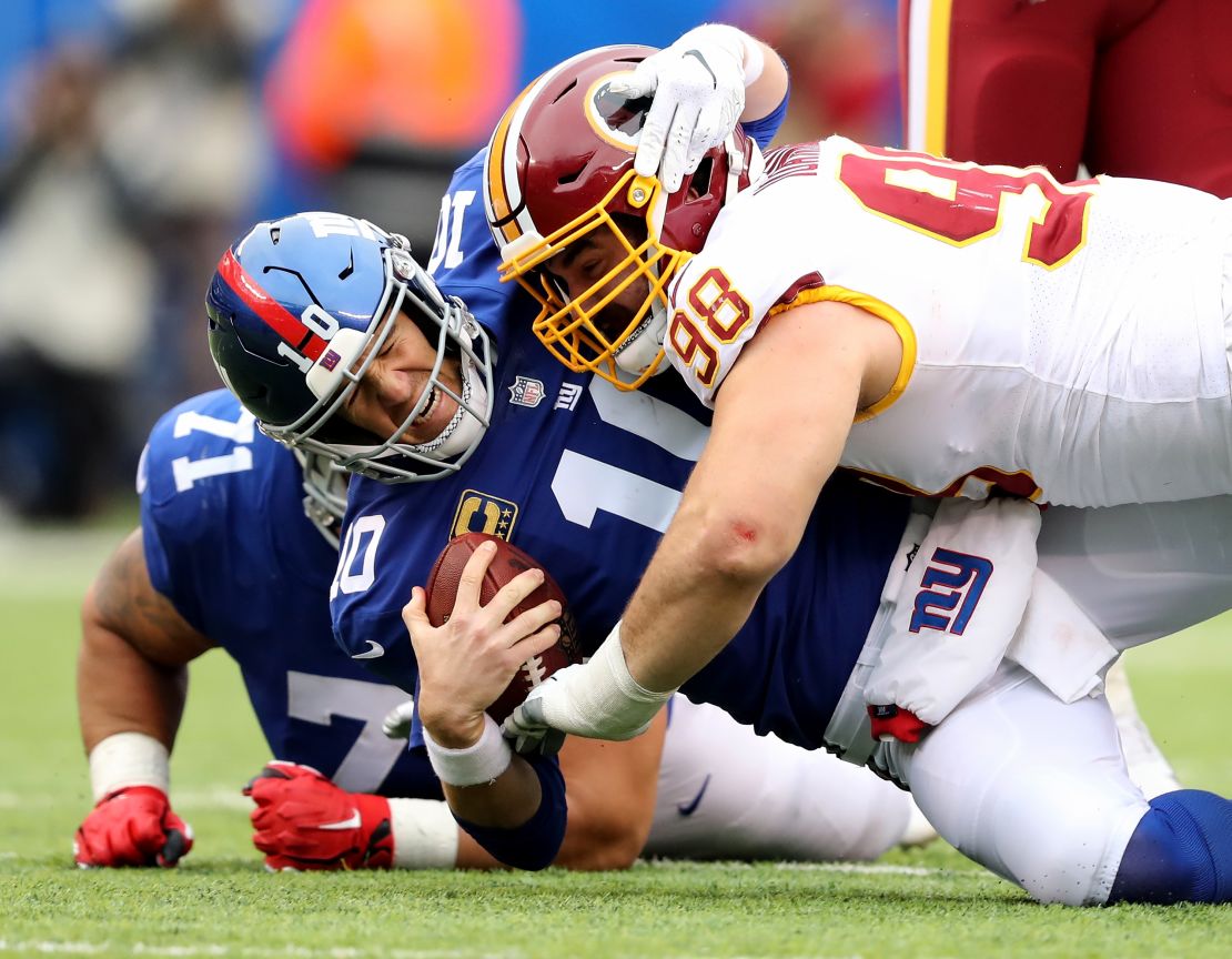 Eli Manning is sacked by Washington's Matthew Ioannidis. The Giants dropped to 1-7 with their latest loss.