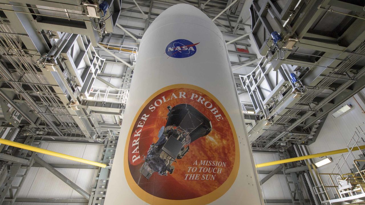 The United Launch Alliance Delta IV Heavy rocket payload fairing is seen with the NASA and Parker Solar Probe emblems. 
