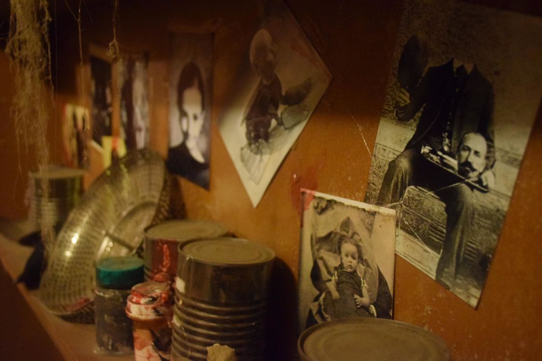 Props like old photos can convey a sense of unease.