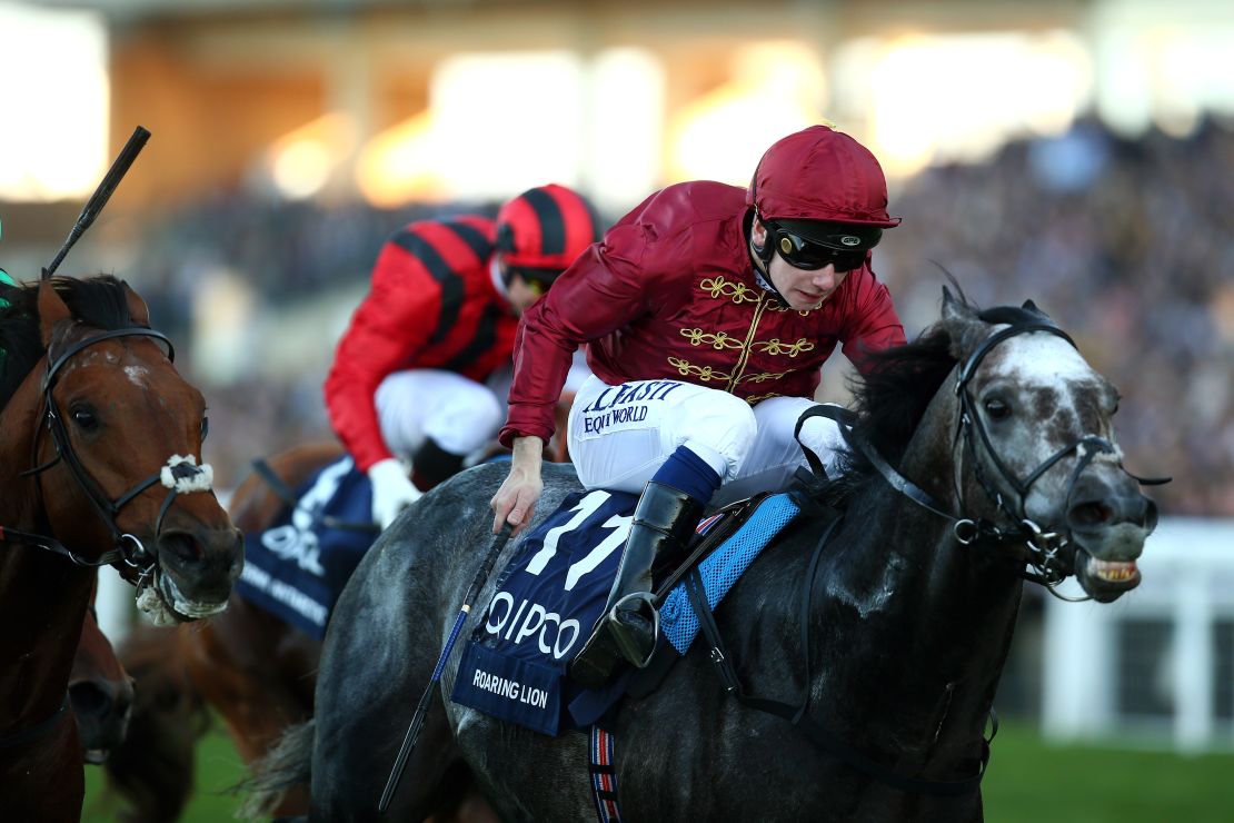 Oisin Murphy rides Roaring Lion to victory in the Queen Elizabeth II Stakes on Champions Day at Ascot.