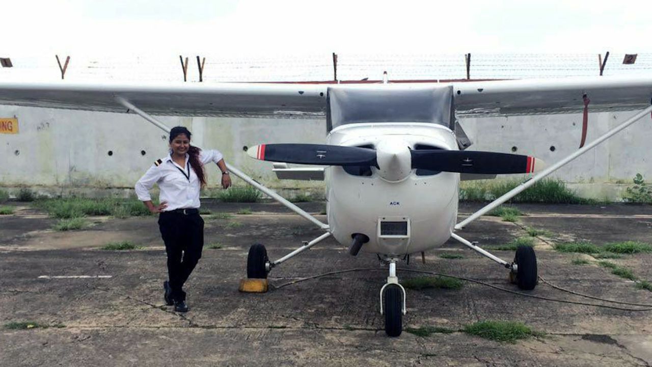 Captain Tarana Saxena poses with beside a Cessna at Banasthali Vidyapith University.