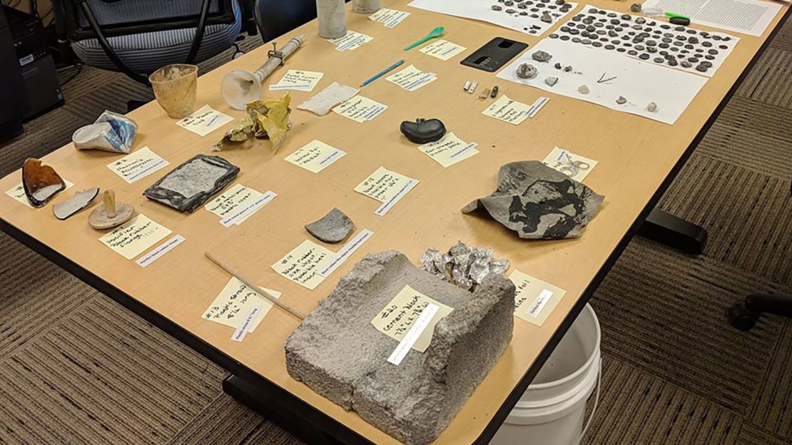 Some of the items collected after the Ear Spring eruption include cans, a cement block and a plastic straw.