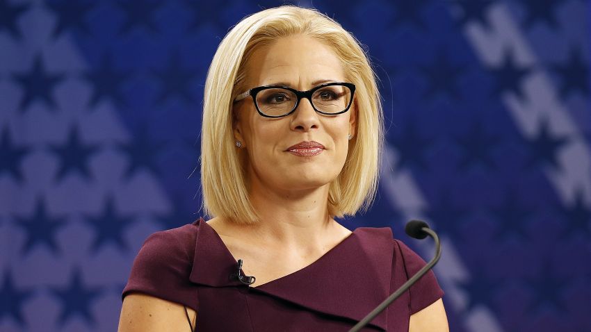 U.S. Rep. Kyrsten Sinema, D-Ariz., goes over the rules in a television studio prior to a televised debate with U.S. Rep. Martha McSally, R-Ariz., Monday, Oct. 15, 2018, in Phoenix. Both ladies are seeking to fill the seat of U.S. Sen. Jake Flake, R-Ariz. who is retiring. The Arizona Senate contest is one of the most closely-watched in the nation. 