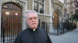 In this file photo, Father John Jenik, then the pastor of Our Lady of Refuge, is pictured in the Bronx, August 17, 2006. Now an auxiliary Catholic bishop, Jenik has been accused of sexual abuse and removed from his public ministry, Catholic officials said on October 31, 2018. Jenik denies the allegation.