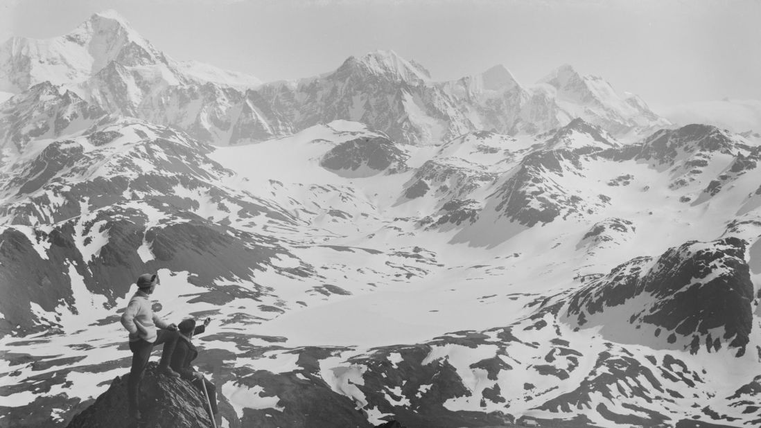 <strong>Glacier gateway</strong>: The journey initially began on South Georgia Island, a glacier-covered island about eleven hundred miles eastwards of Cape Horn, Chile, which Shackleton called "the Gateway to the Antarctic." <em>Pictured here: expedition member Frank Worsley peers down on the Endurance.</em>