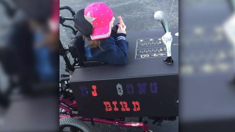 Because female DJs are rare, Julia dressed up as a DJ, and the wheelchair was her booth.