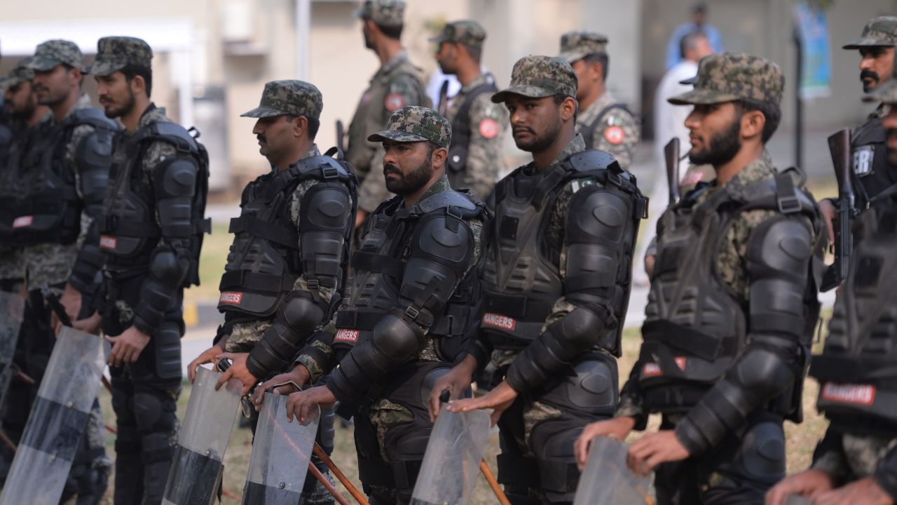 Pakistani paramilitary soldiers stand guard outside the Supreme Court building in Islamabad on October 31.