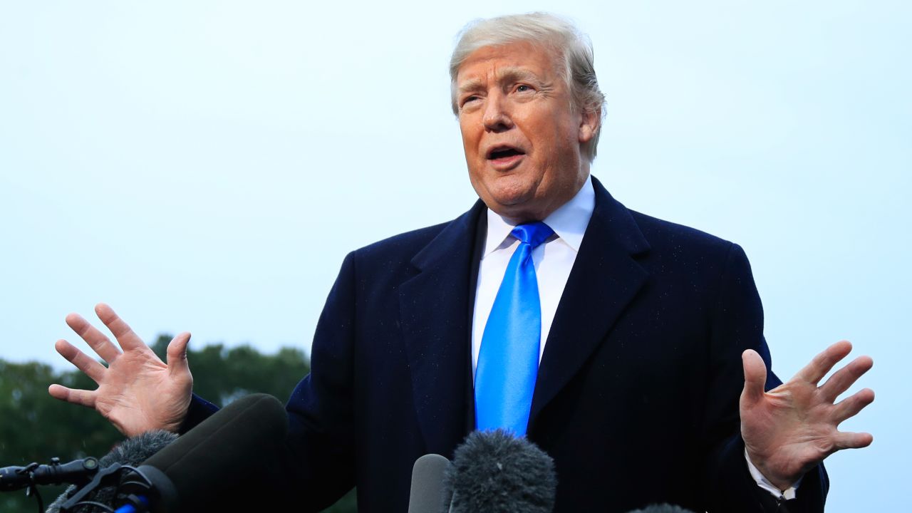 President Donald Trump speaks to the members of the media before leaving the White House in Washington, Friday, Oct. 26, 2018, to attend a campaign rally in Charlotte, N.C.