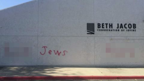 Police captured this image of graffiti found Wednesday on a synagogue in Irvine, California. The profane words have been blurred out.