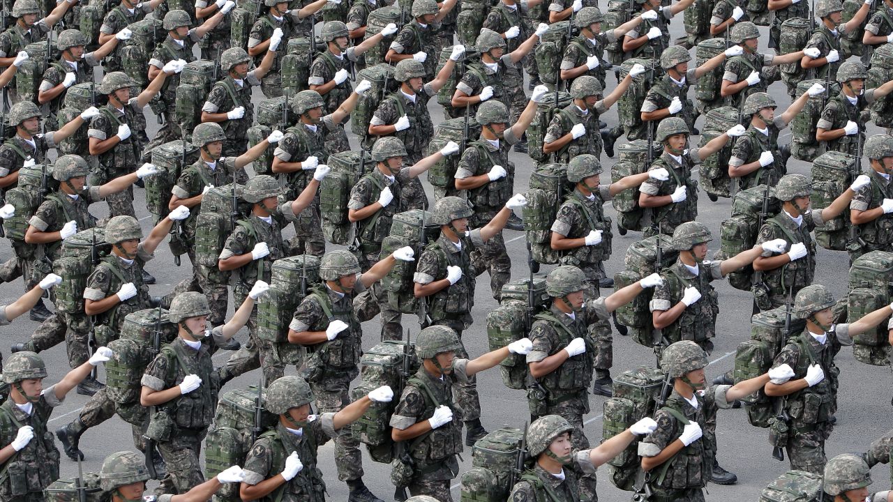 South Korean army soldiers march during a ceremony at Seongnam Military Airbase. The country long jailed more conscientious objectors than any other nation in the world. 