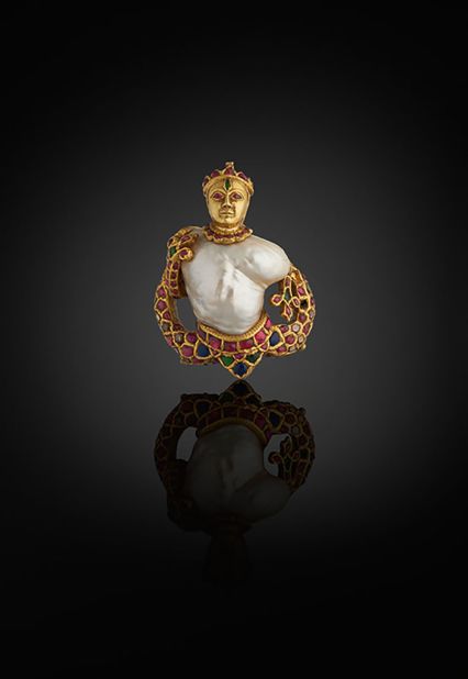 This rare pendant, made in India, was inspired by European Renaissance jewelry, where baroque pearls were used as the torso for figurative compositions depicting mythical creatures, according to the exhibition's catalog. Accompanying the pearl are gems used in the typical Indian "kundan" setting -- a combination of rubies, emeralds, sapphires, along with gold and glass. The figure itself is likely to be a snake god, or Nagadevata.