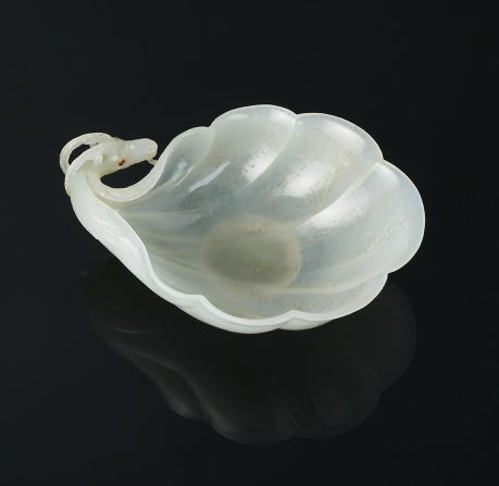 Mughal jade was hugely-prized and this exquisite 17th-century jade bowl, featuring a wild goat or ibex head, was later inscribed with a poem in Chinese written by Emperor Qianlong. In it, he extols the virtue of the craftsmanship: "This cup comes from far-off lands where it was carefully carved and pierced by fine artisans." 