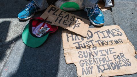 Andrew Loy begs along a sidewalk in downtown San Francisco, California in June 2016. Homelessness is on the rise.