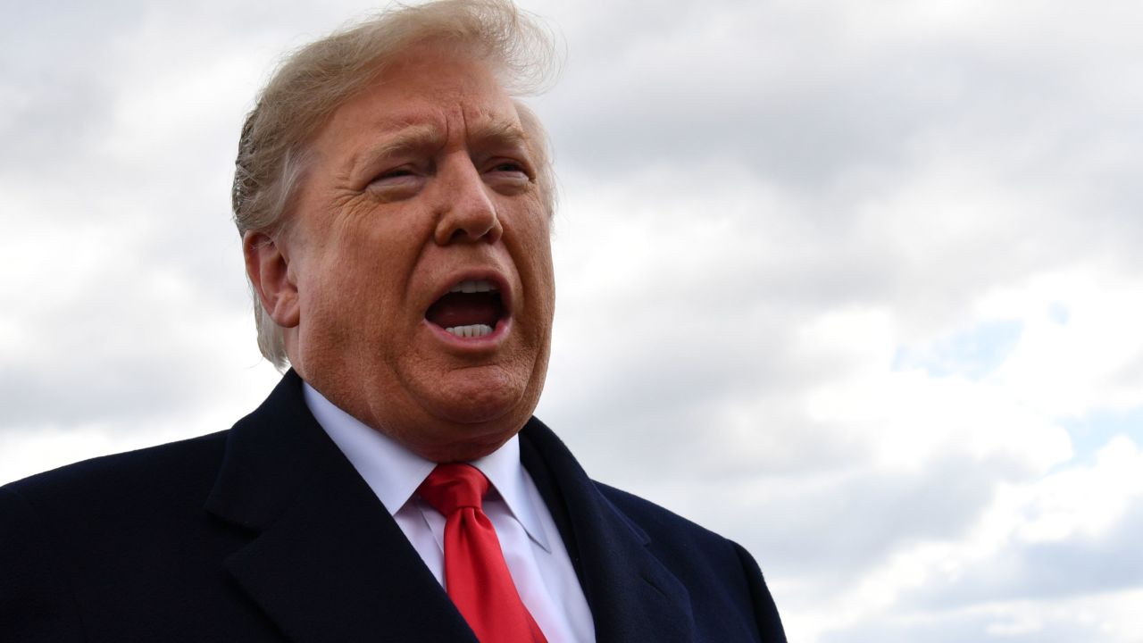 US President Donald Trump speaks with reporters after landing at Indianapolis International Airport on October 27, 2018 in Indiana. (Photo by Nicholas Kamm / AFP)        (Photo credit should read NICHOLAS KAMM/AFP/Getty Images)